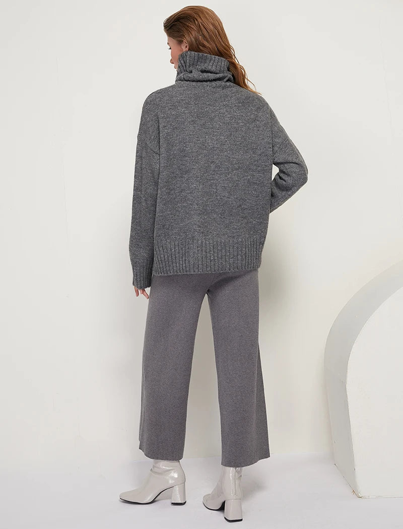 Sophisticated solid knitted two-piece set with turtleneck batwing sweater and casual wide leg pants loungewear set
