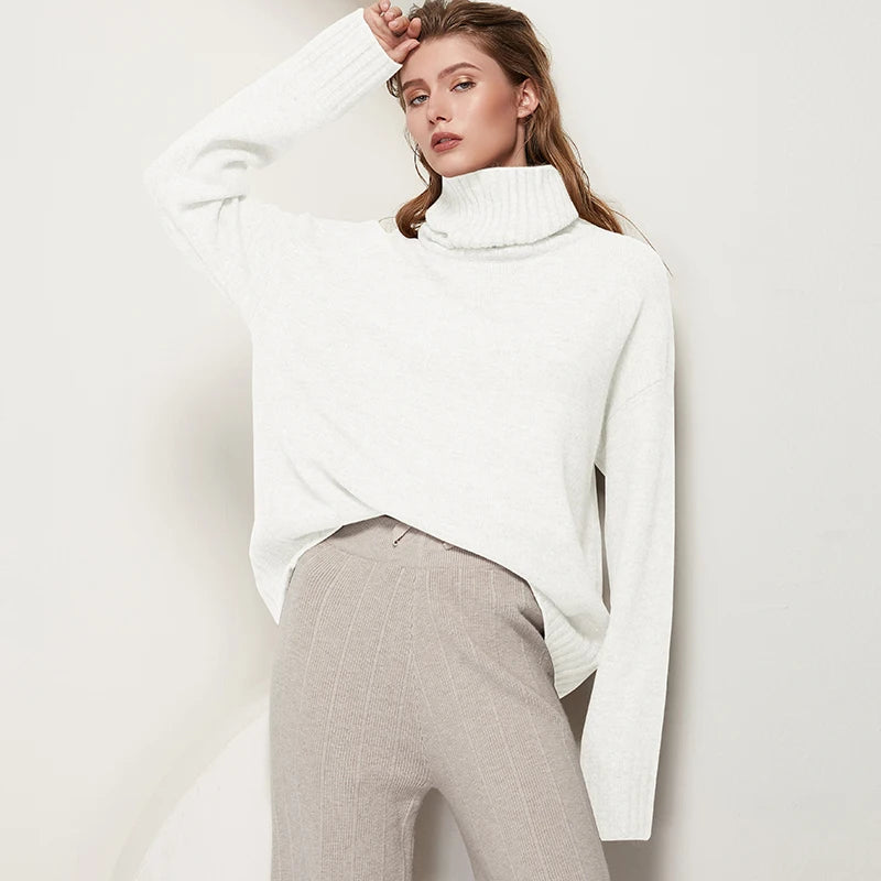 Sophisticated solid knitted two-piece set with turtleneck batwing sweater and casual wide leg pants loungewear set