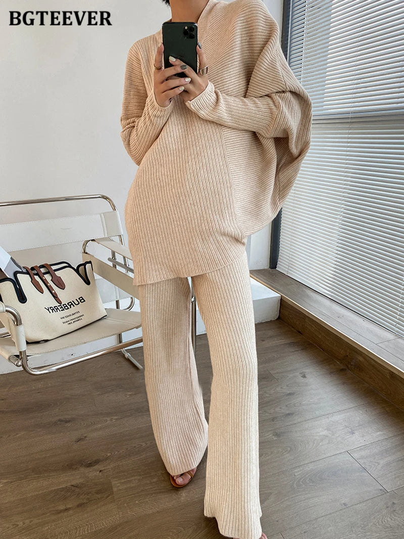 Elevate your winter wardrobe with our chic Knitted 2-Piece Set for women, boasting a turtleneck collar and high-waisted wide-leg pants. This cozy loungewear coy exudes both comfort and sophistication