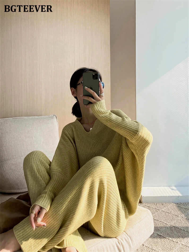 Elevate your winter wardrobe with our chic Knitted 2-Piece Set for women, boasting a turtleneck collar and high-waisted wide-leg pants. This cozy loungewear coy exudes both comfort and sophistication