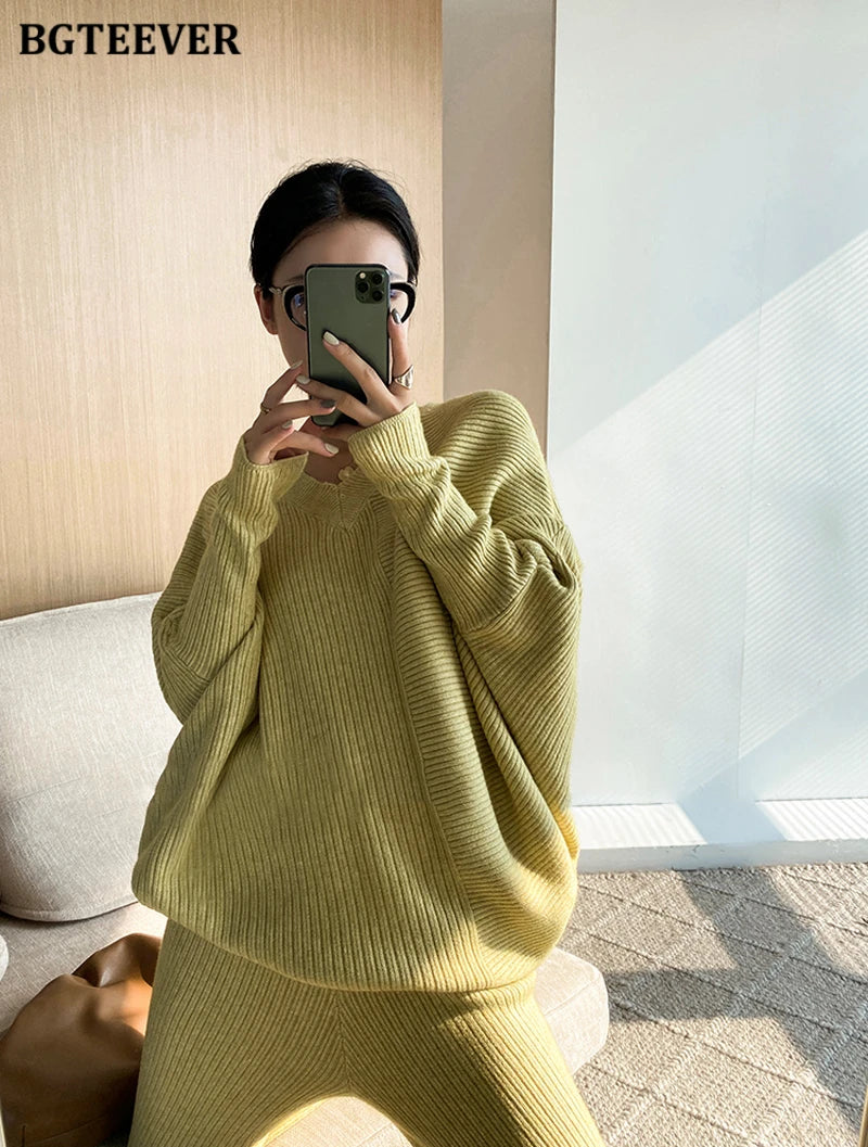 Elevate your winter wardrobe with our chic Knitted 2-Piece Set for women, boasting a turtleneck collar and high-waisted wide-leg pants. This cozy loungewear coy exudes both comfort and sophistication