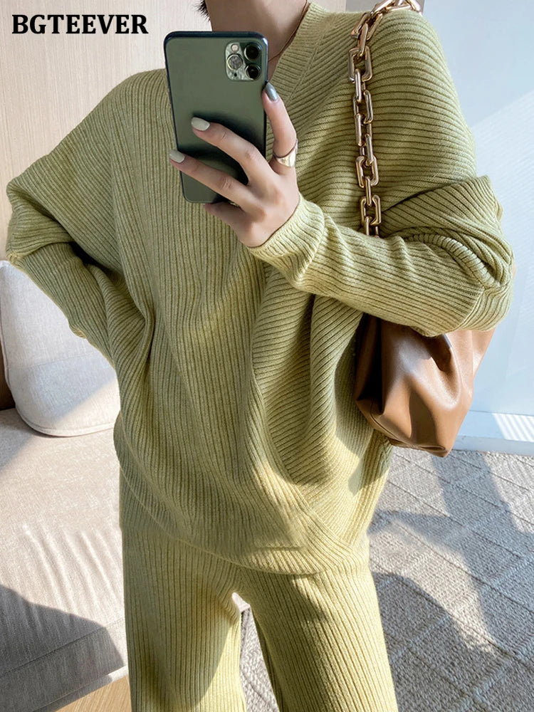 Elevate your winter wardrobe with our chic Knitted 2-Piece Set for women, boasting a turtleneck collar and high-waisted wide-leg pants. This cozy loungewear coy exudes both comfort and sophistication