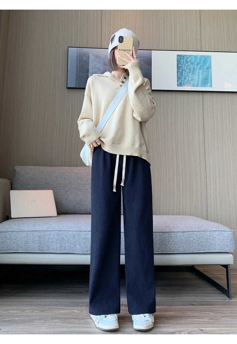 Women's Long Fleece-Lined Pants for autumn and winter. Featuring a flattering high waist and wide-leg silhouette, these pants offer both warmth and timeless elegance