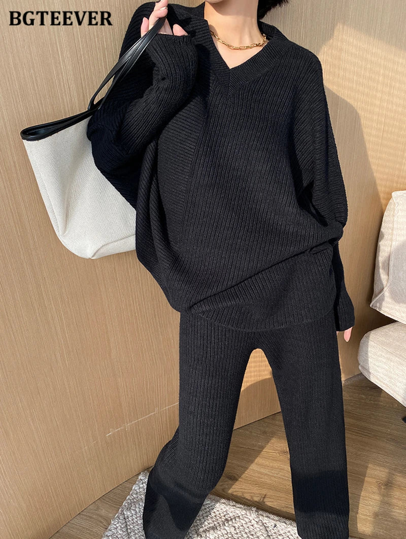 Elevate your winter wardrobe with our chic Knitted 2-Piece Set for women, boasting a turtleneck collar and high-waisted wide-leg pants. This cozy loungewear coy exudes both comfort and sophistication