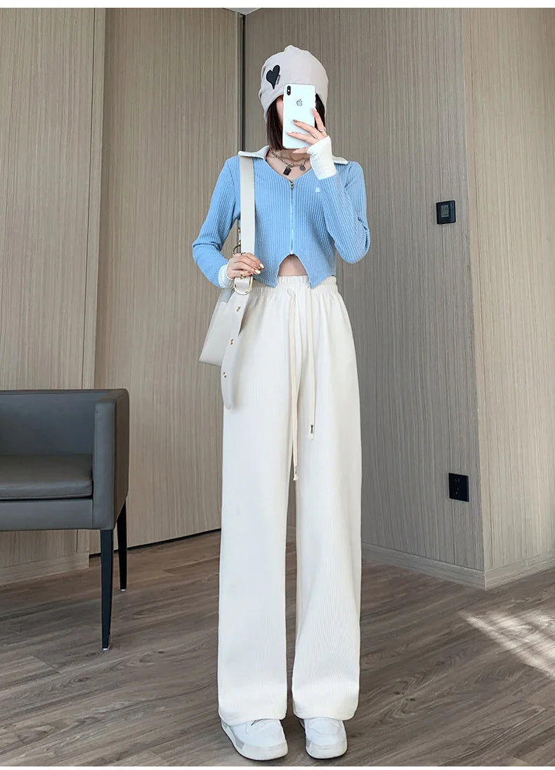 Women's Long Fleece-Lined Pants for autumn and winter. Featuring a flattering high waist and wide-leg silhouette, these pants offer both warmth and timeless elegance