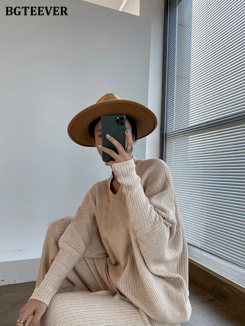 Elevate your winter wardrobe with our chic Knitted 2-Piece Set for women, boasting a turtleneck collar and high-waisted wide-leg pants. This cozy loungewear coy exudes both comfort and sophistication