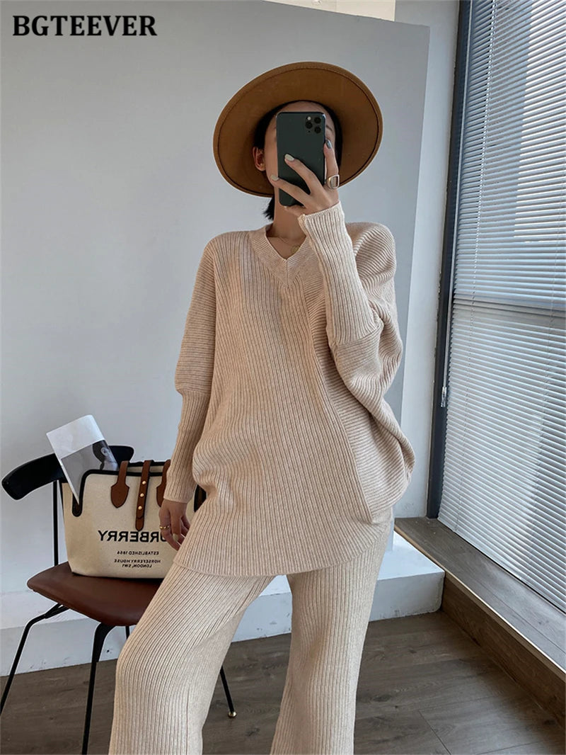 Elevate your winter wardrobe with our chic Knitted 2-Piece Set for women, boasting a turtleneck collar and high-waisted wide-leg pants. This cozy loungewear coy exudes both comfort and sophistication