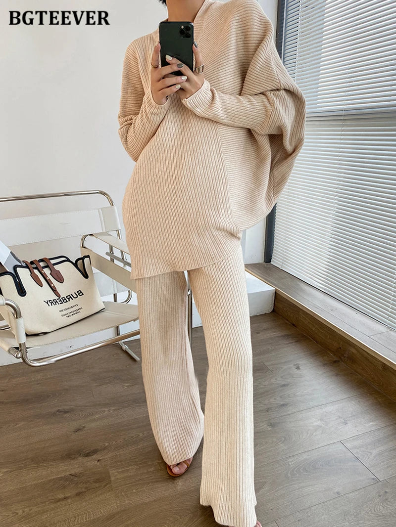 Elevate your winter wardrobe with our chic Knitted 2-Piece Set for women, boasting a turtleneck collar and high-waisted wide-leg pants. This cozy loungewear coy exudes both comfort and sophistication