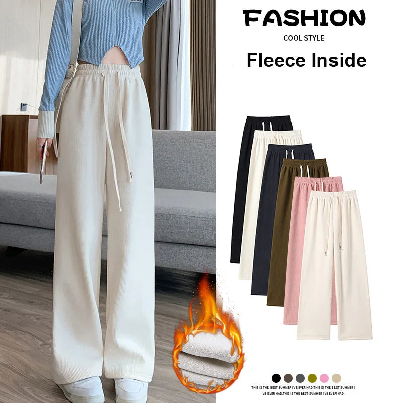 Women's Long Fleece-Lined Pants for autumn and winter. Featuring a flattering high waist and wide-leg silhouette, these pants offer both warmth and timeless elegance
