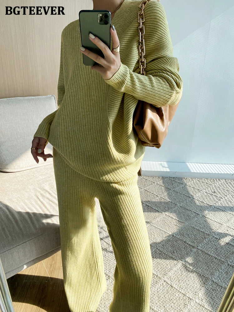Elevate your winter wardrobe with our chic Knitted 2-Piece Set for women, boasting a turtleneck collar and high-waisted wide-leg pants. This cozy loungewear coy exudes both comfort and sophistication
