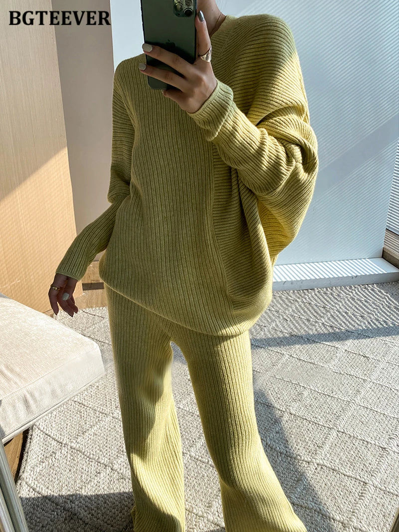 Elevate your winter wardrobe with our chic Knitted 2-Piece Set for women, boasting a turtleneck collar and high-waisted wide-leg pants. This cozy loungewear coy exudes both comfort and sophistication