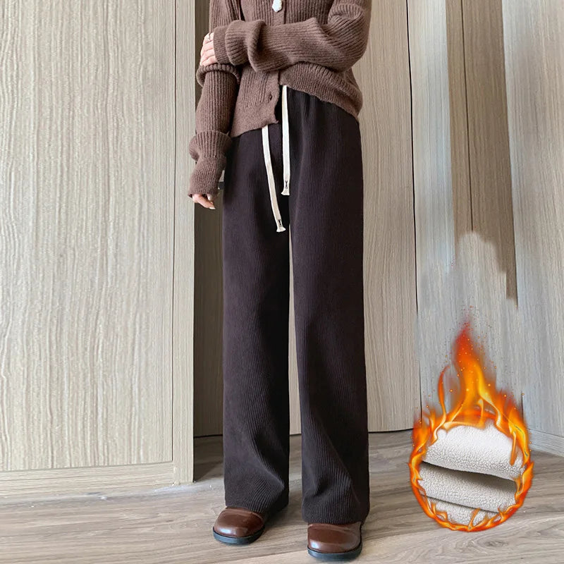 Women's Long Fleece-Lined Pants for autumn and winter. Featuring a flattering high waist and wide-leg silhouette, these pants offer both warmth and timeless elegance