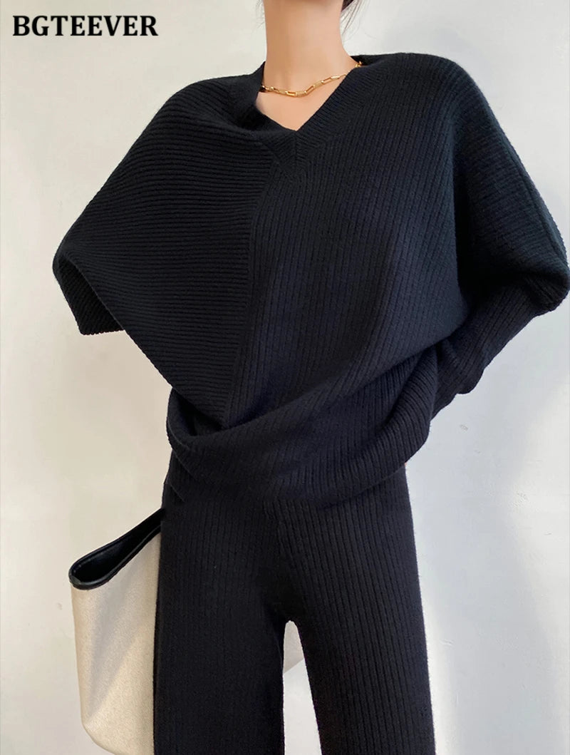 Elevate your winter wardrobe with our chic Knitted 2-Piece Set for women, boasting a turtleneck collar and high-waisted wide-leg pants. This cozy loungewear coy exudes both comfort and sophistication