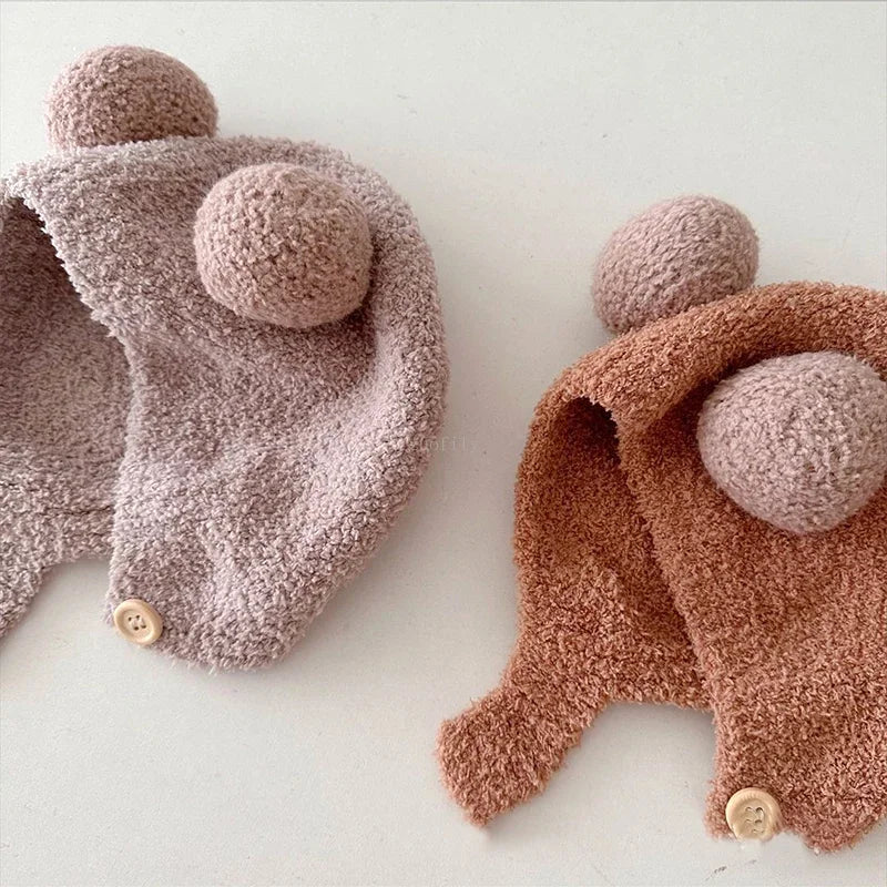 Chapeaux confortables en laine polaire pour enfants avec des accents de pompons pour l'hiver