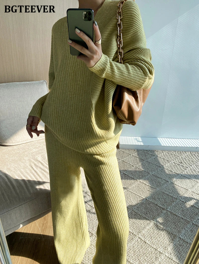 Elevate your winter wardrobe with our chic Knitted 2-Piece Set for women, boasting a turtleneck collar and high-waisted wide-leg pants. This cozy loungewear coy exudes both comfort and sophistication